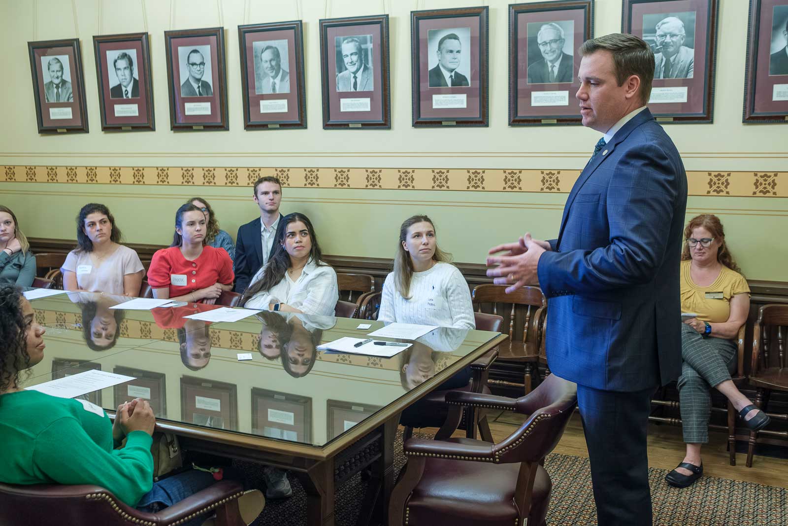John Fitzgerald talks with students
