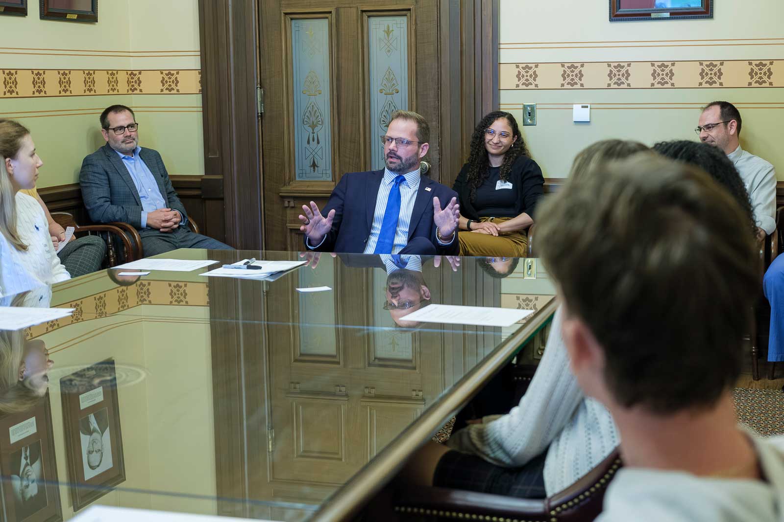 Bryan Posthumus speaks with students