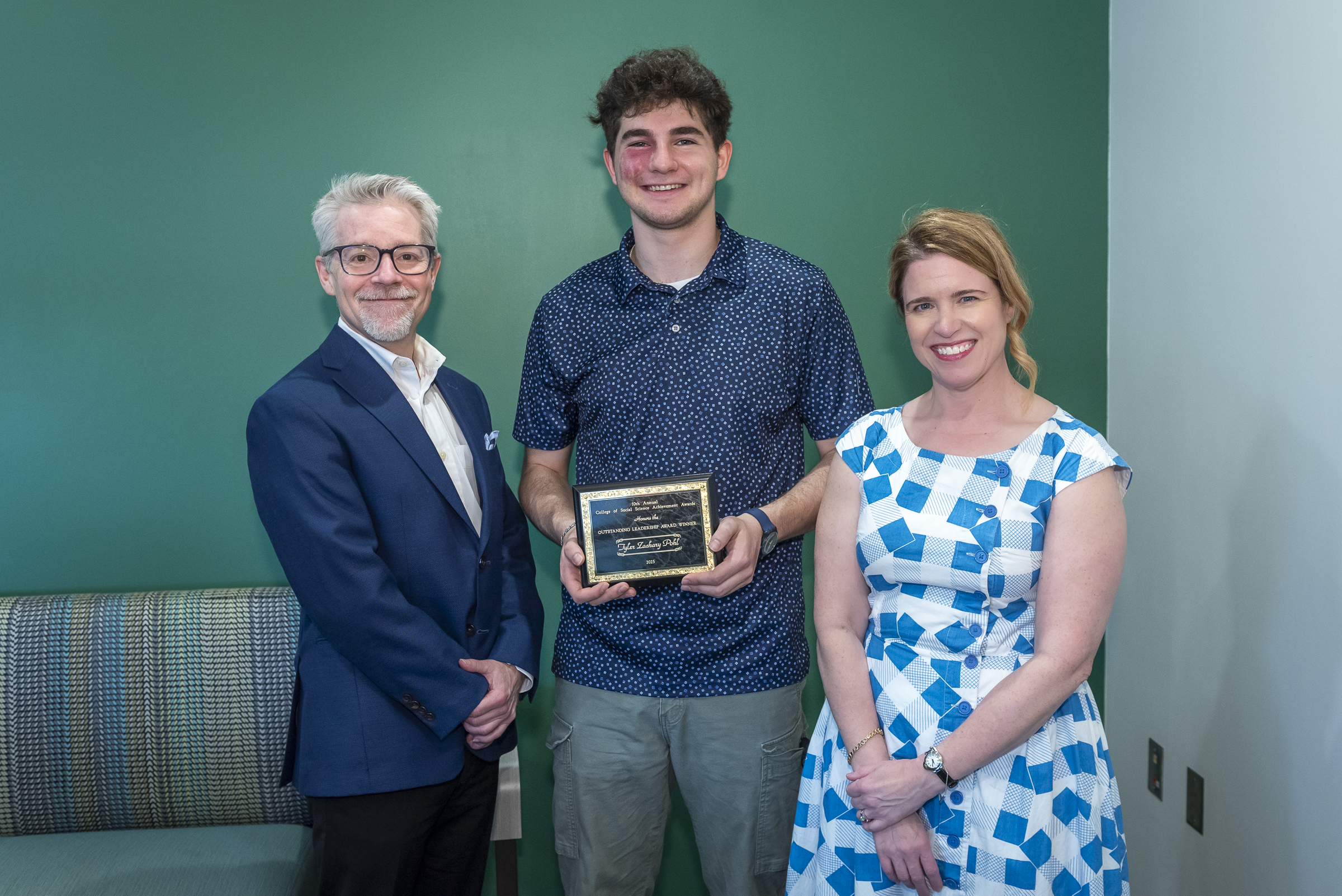 Dean Donnellan, Tyler Pohl and Assistant Dean Emily Durbin